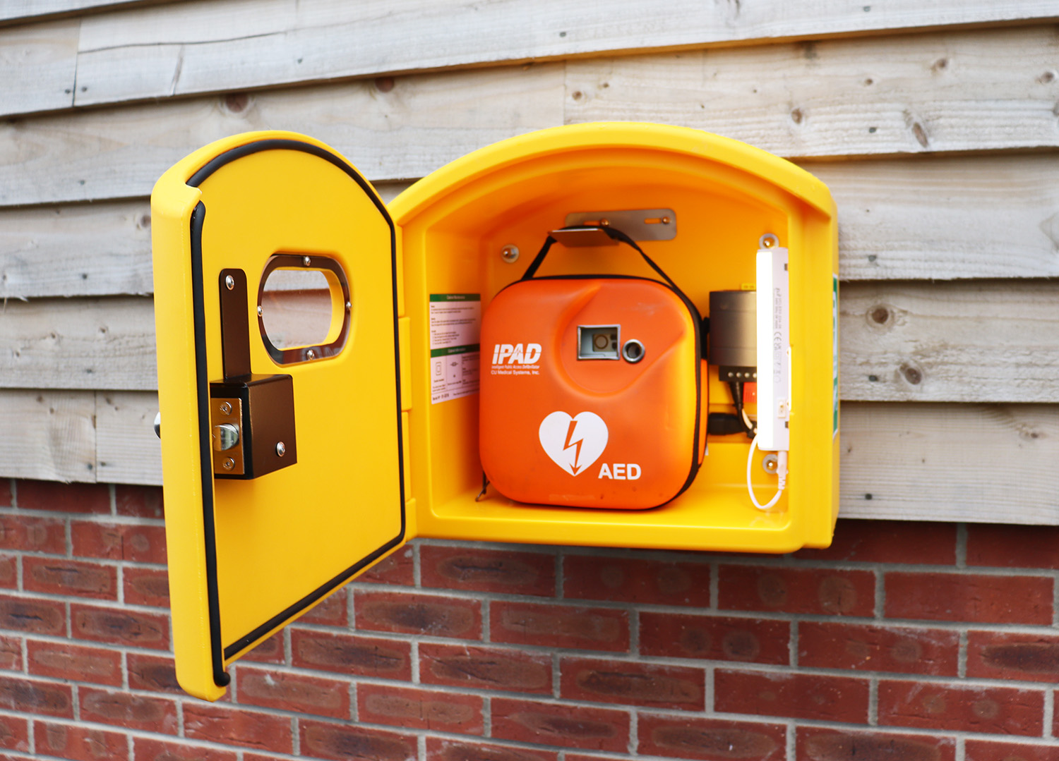 A new defibrillator installed outside Orston Pavilion is accessible 247