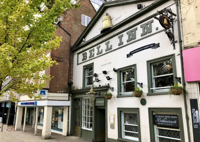 Woman charged after windows smashed at historic Nottingham pub