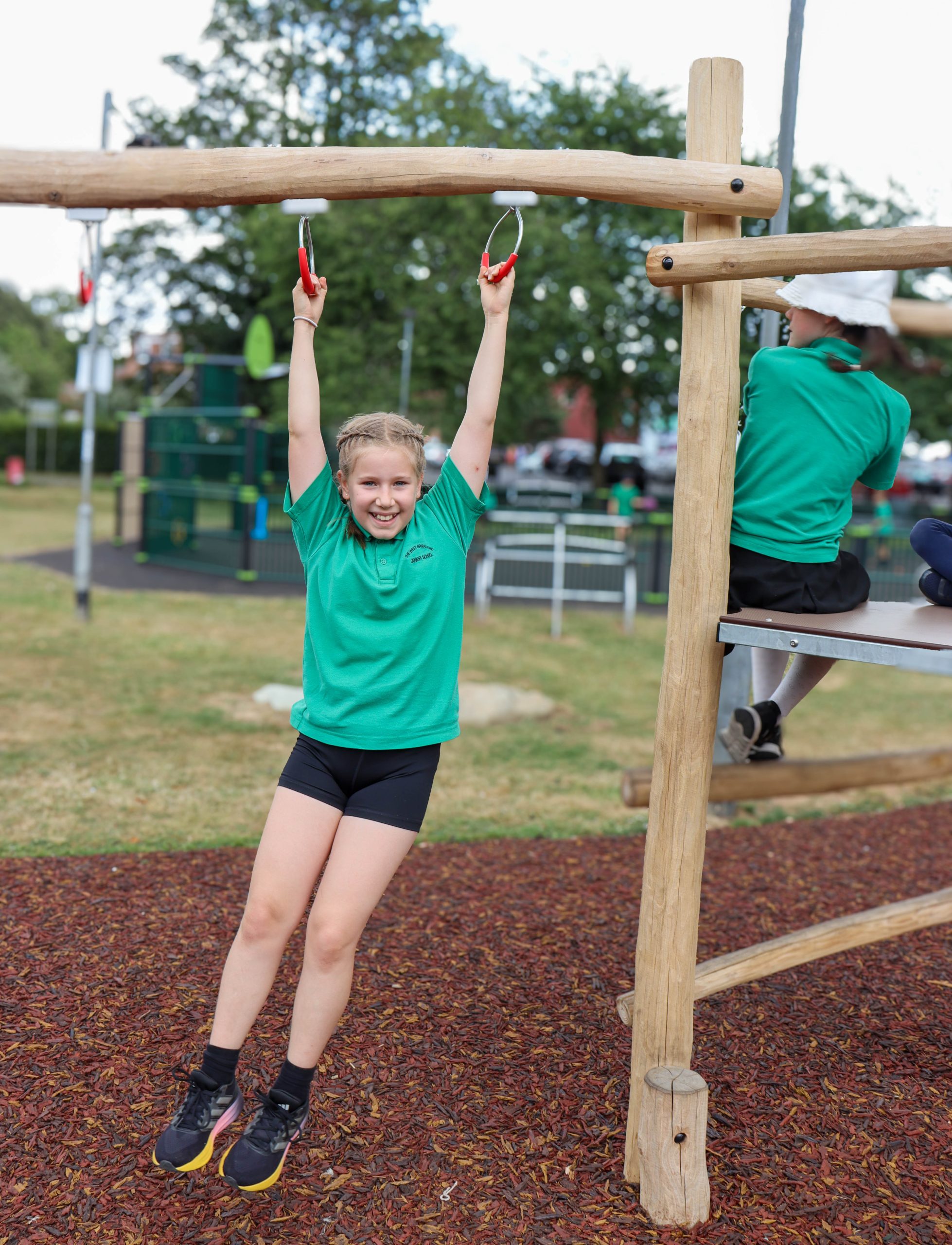 A new teen workout unit featuring monkey bars and a climbing net has been installed at Bridge Field Teen Park scaled