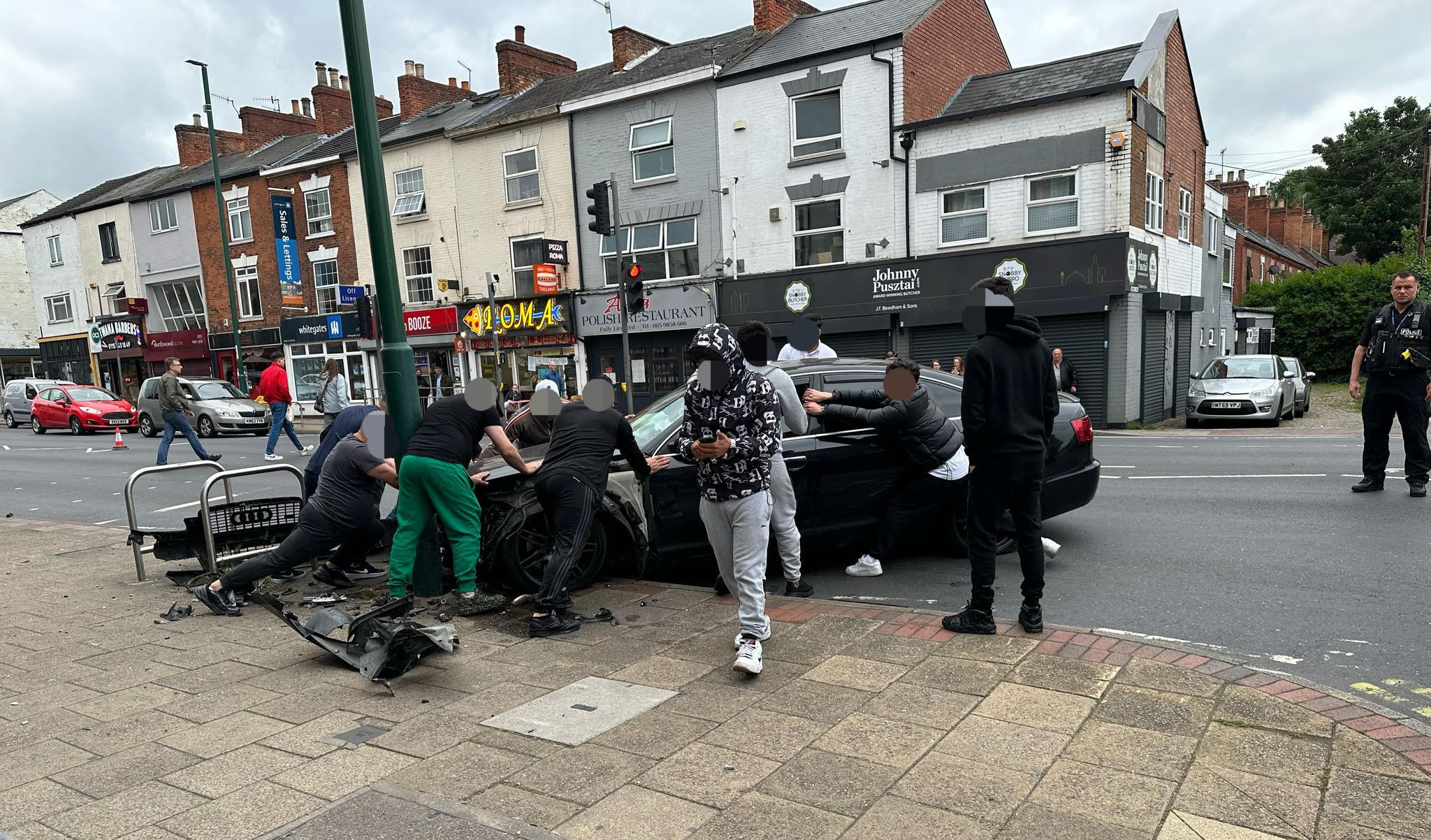 Plans for 20 mph limit on major Nottingham traffic route A crashed car in Mansfield Road Sherwood Asif Kassam