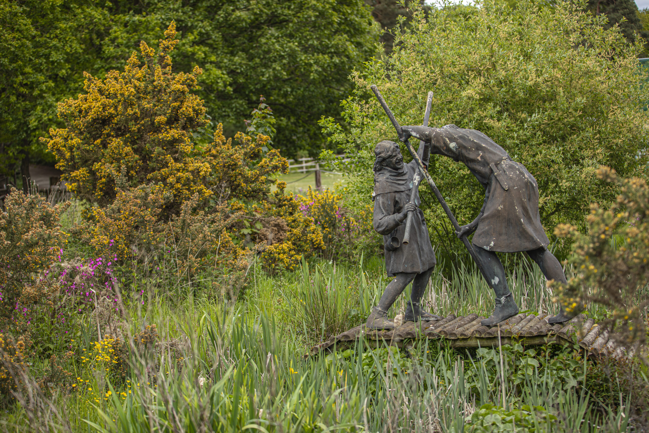A statue of Robin Hood and Little John standing in Sherwood Forest credit Ben Andrew RSPB Images scaled